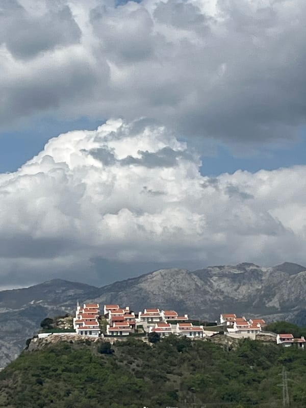 Hillside residential scene documented in Blizikuće, Montenegro