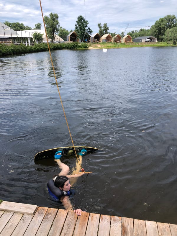 Summer day at wakeboarding park captures recreation and leisure
