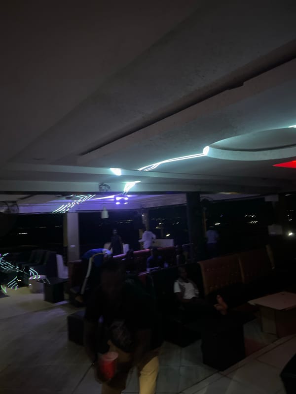 Nigerian nightclub patrons display luxury watches during evening gathering