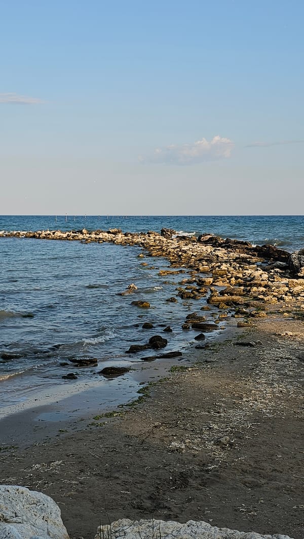 Balchik's beach, palace, and coastline on a summer afternoon