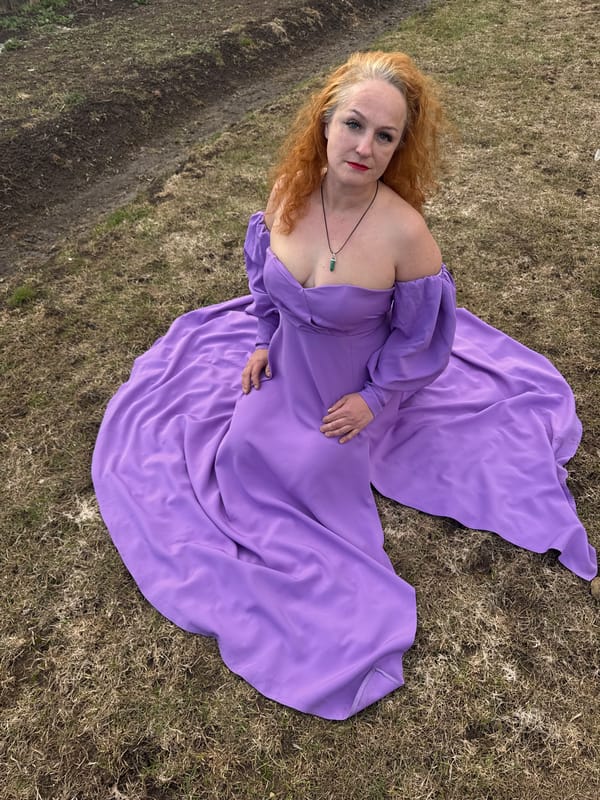 Woman in purple dress photographed in artistic poses, Chaikovsky