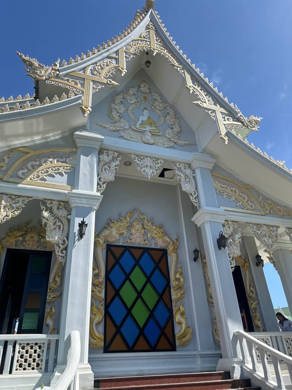 Temple visit with golden Buddha and riverside fish feeding