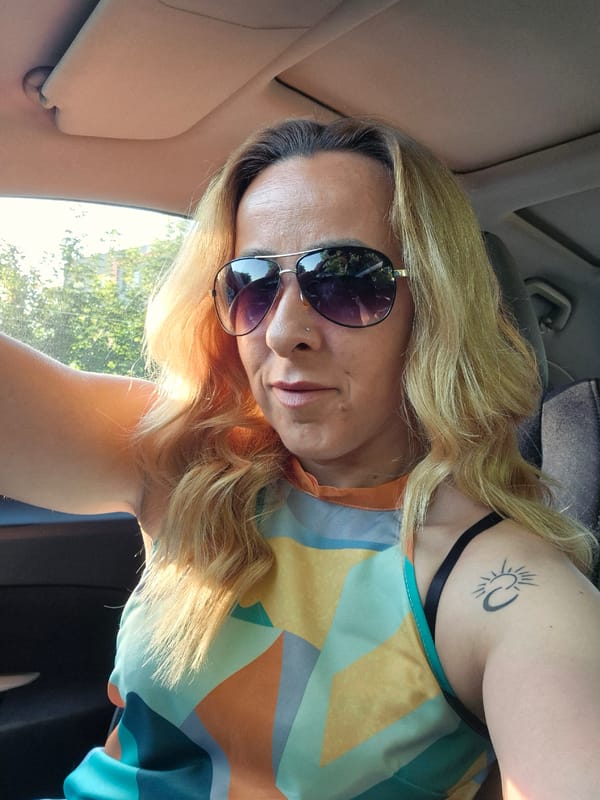 Woman Takes Multiple Selfies in Parked Car During Early Morning
