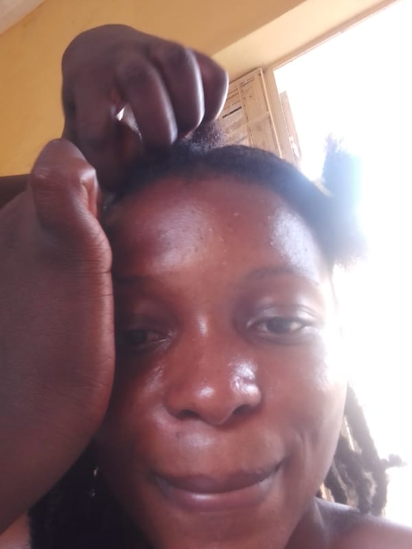 Hair braiding session documented across an afternoon in Jimeta