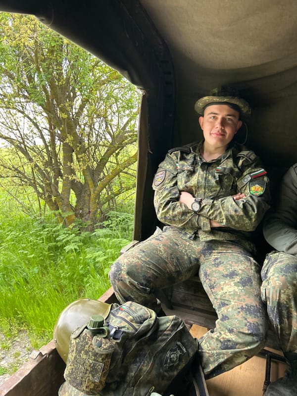 Bulgarian soldier rests in military vehicle near Kostena Reka
