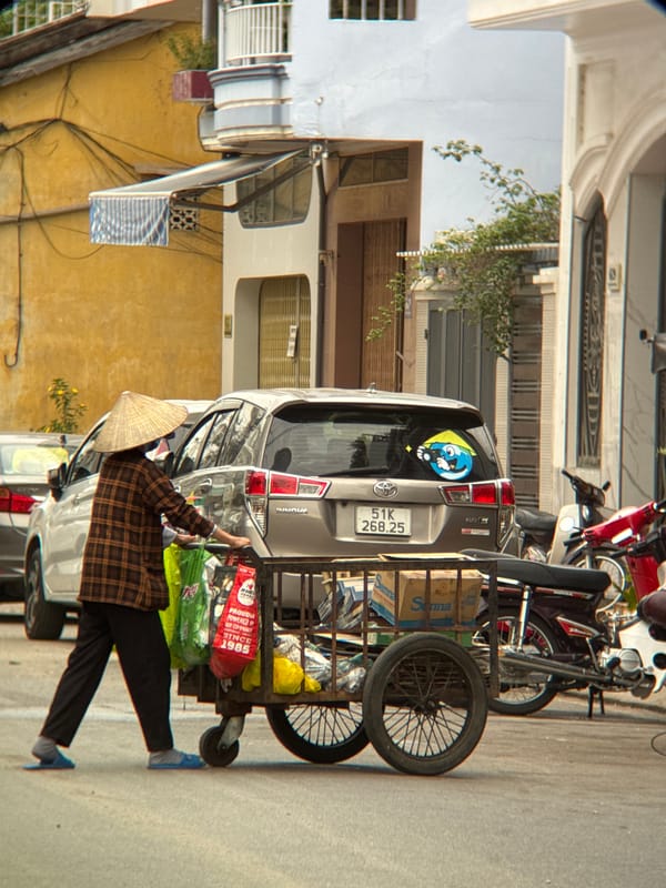 Everyday street traffic flows through central Nha Trang