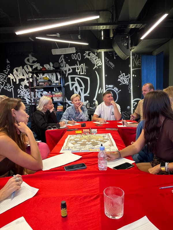 Board game gathering at graffiti-decorated cafe in Kuta Selatan