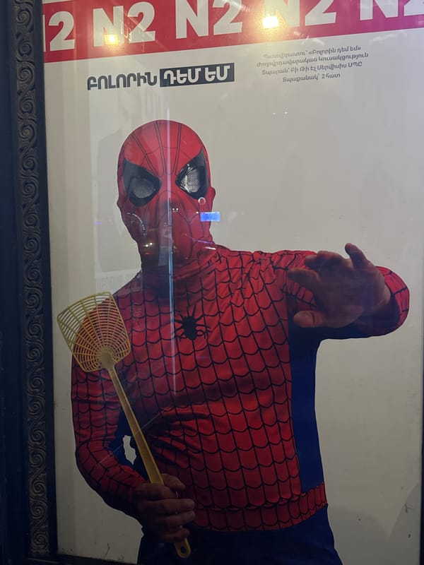 Political poster and winged sketch documented in Yerevan