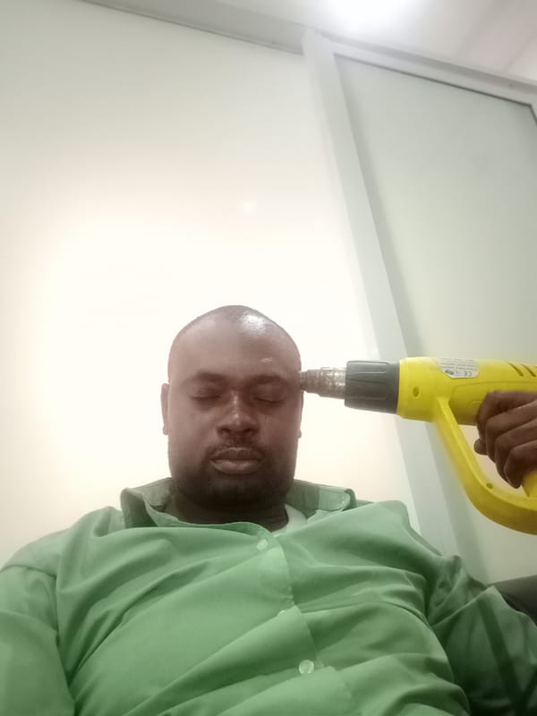 Man photographed with heat gun in Gwarinpa home