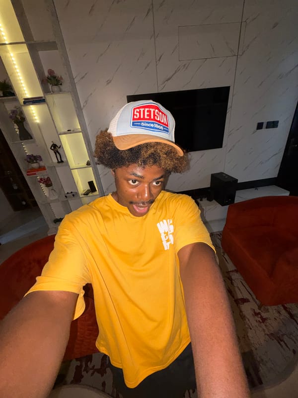 Man resting on carpet in modern Nigerian home