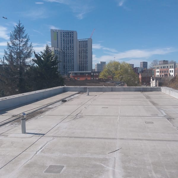 Building survey documented in Coventry shows rooftops, hallways, exteriors