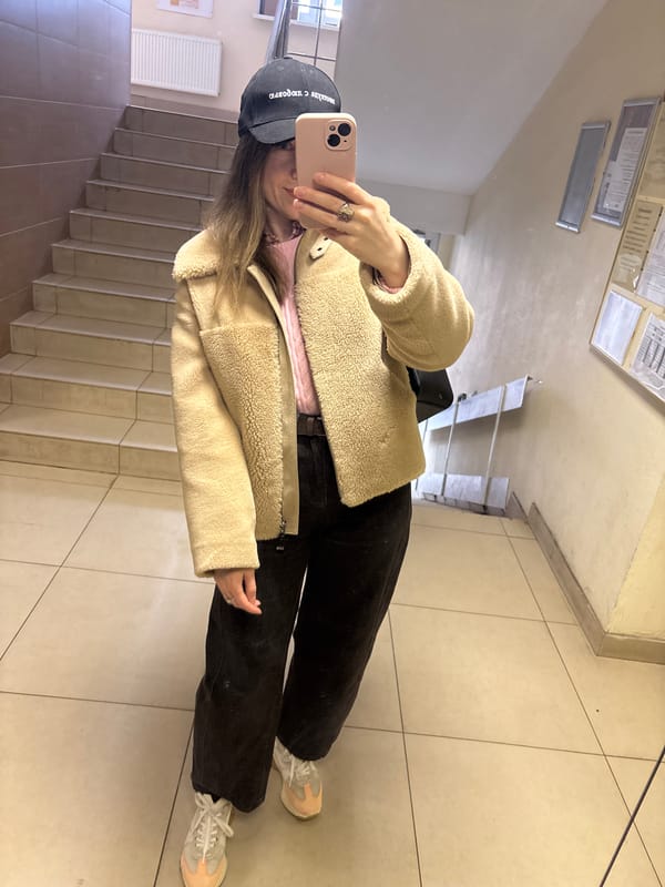 Person takes selfie in building in Kudrovo, Russia