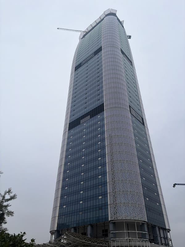 Incomplete Capital Fort skyscraper photographed from below in Sofia