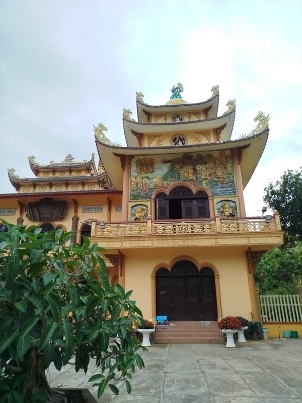 Visitors document morning temple experience at Buu Son Tu, Vietnam
