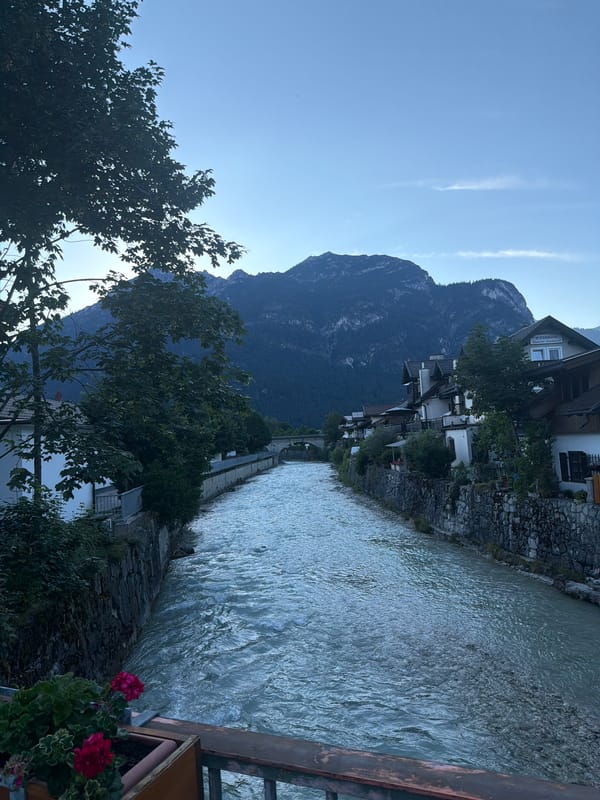 Loisach river cuts through Garmisch-Partenkirchen with Alpine backdrop