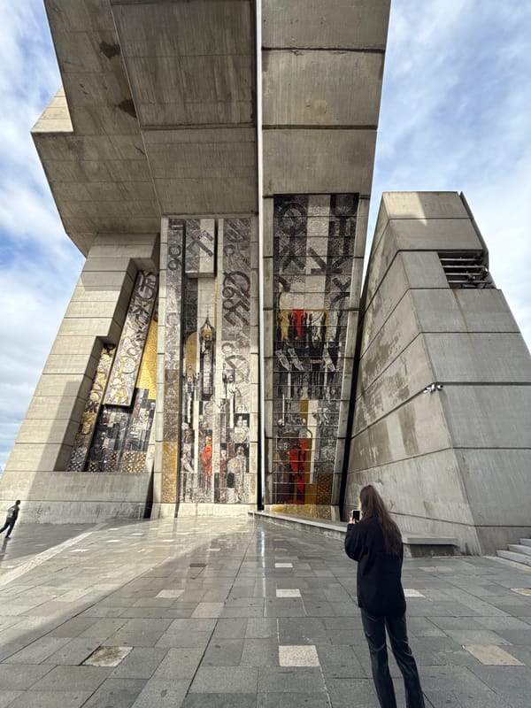 Tourist documents monument complex and mosaic building in Shumen