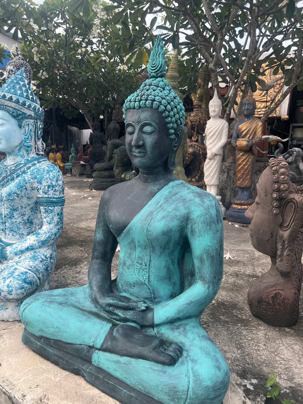 Cruising Ko Samui's streets past Buddha shops and landmarks