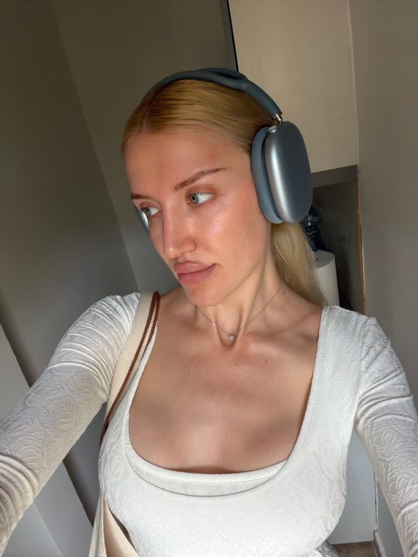 Woman in headphones observed indoors in Belgrade