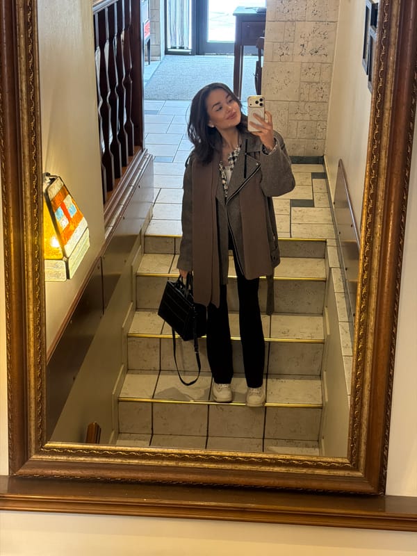 Woman captures selfie in gold mirror in Krasnoyarsk