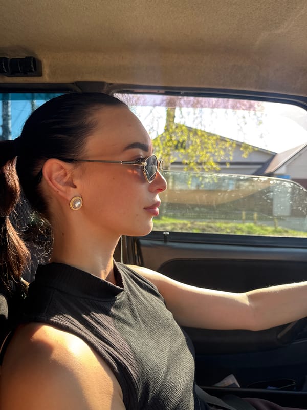 Woman rests in vehicle in Chaikovsky, Russia