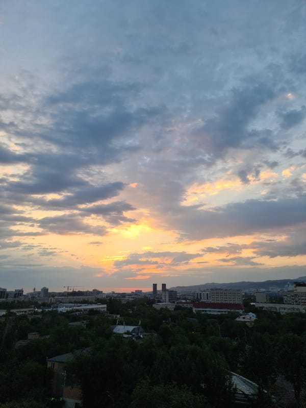 Almaty sunset to nightfall, mosque and skyline in frame