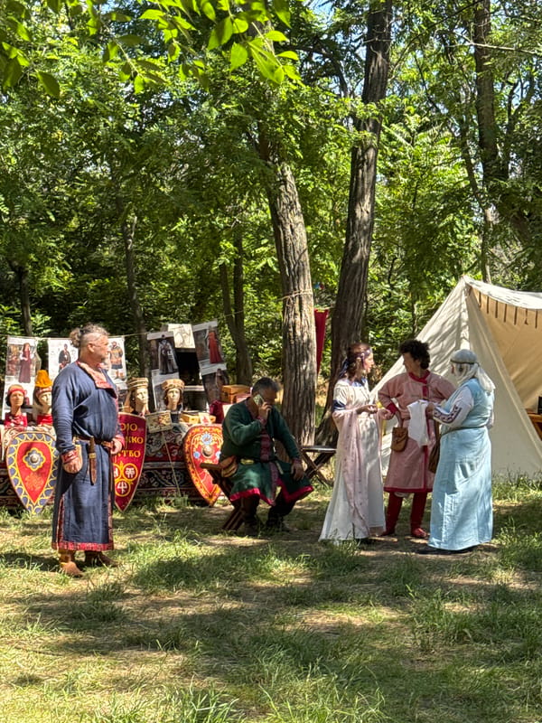 Historical reenactment festival with Roman soldiers and mounted demonstrations