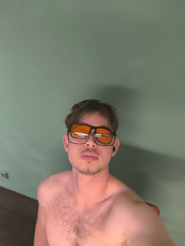 Young man photographed in multiple indoor portraits in Sofia