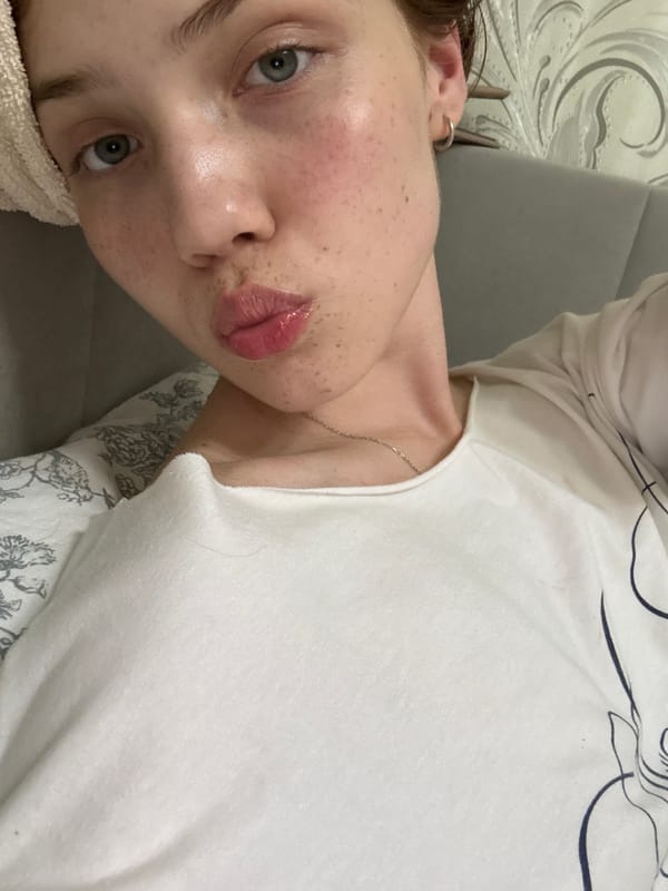 Young woman takes selfies in Naberezhnye Chelny home