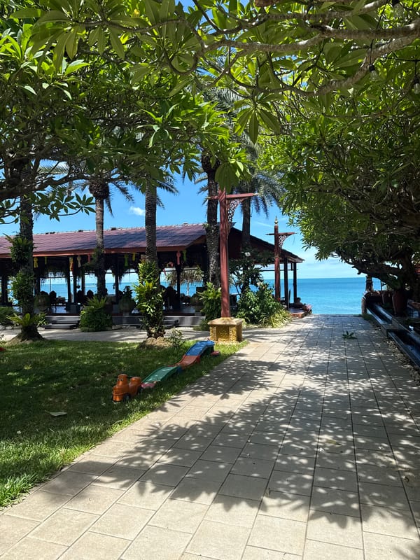 Morning at an ornate Koh Samui resort, drinks and garden details