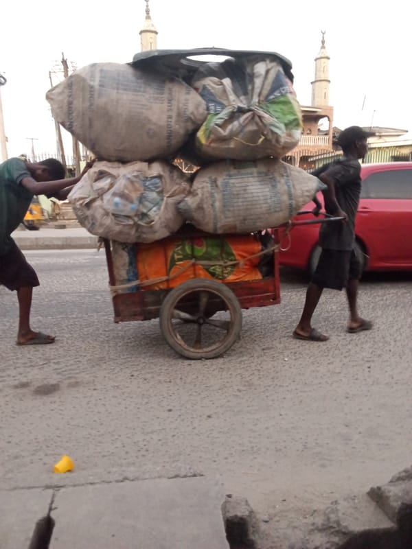 Daily street life documented in Ado, Nigeria evening hours