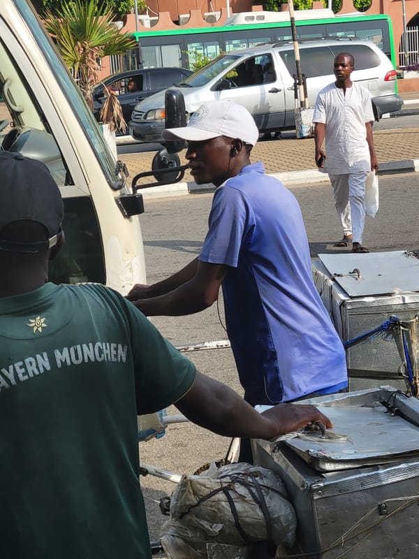 Daily street commerce unfolds across Abuja neighborhoods