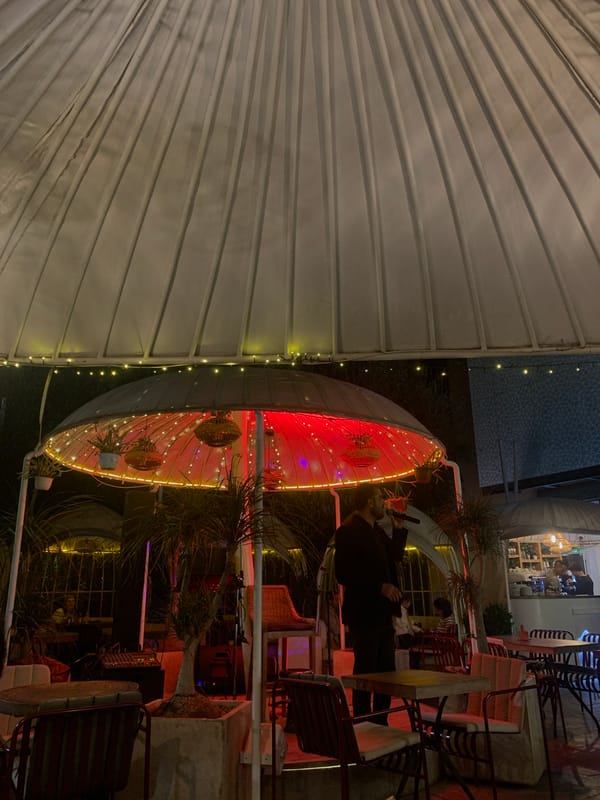 Evening dining scene captured at Marrakesh outdoor restaurant