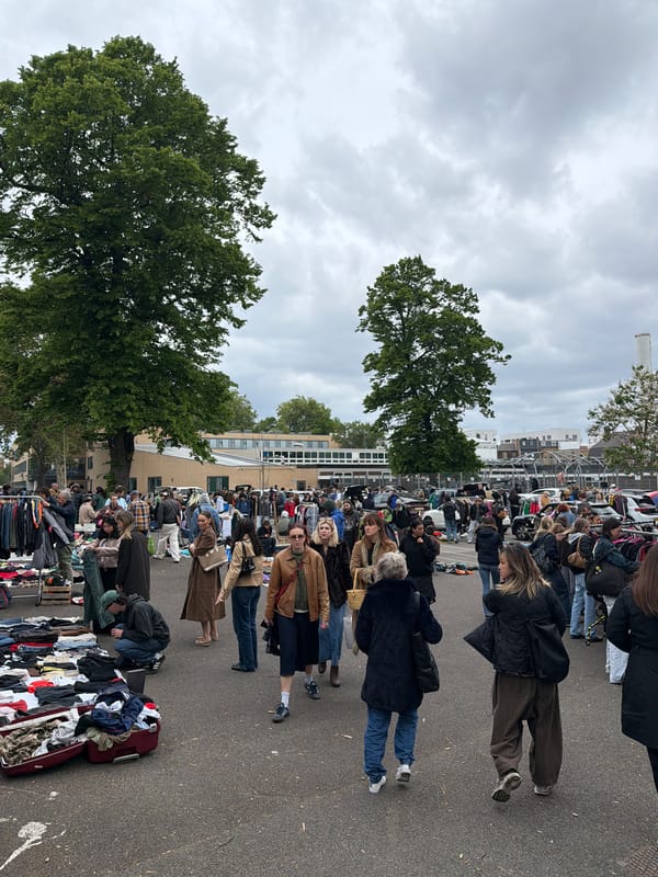 Outdoor market operates with vendors and shoppers in London