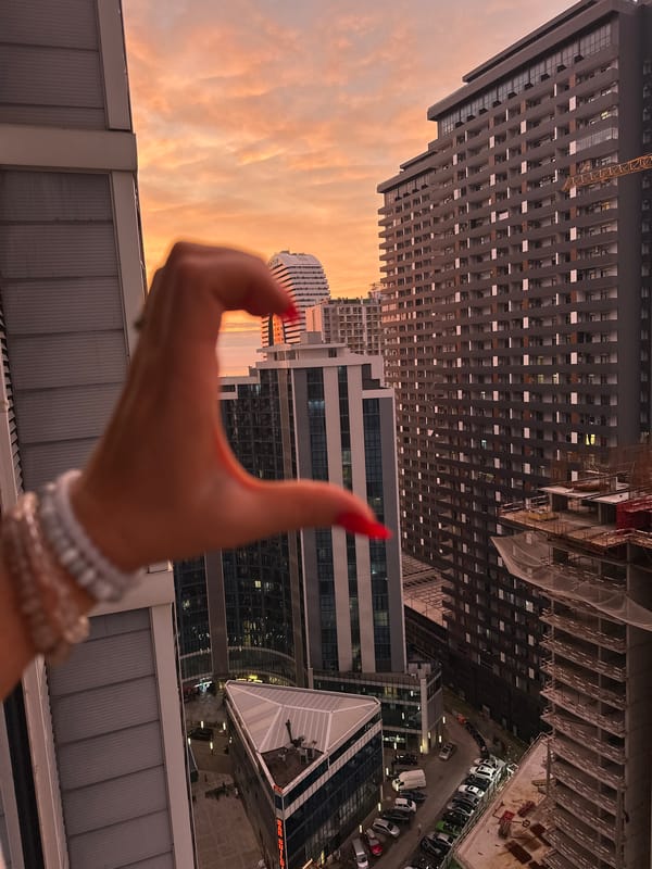 Batumi skyline at golden hour, from ground to rooftop