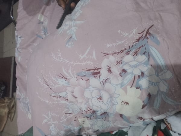 Intimate documentation of personal belongings in bedroom setting