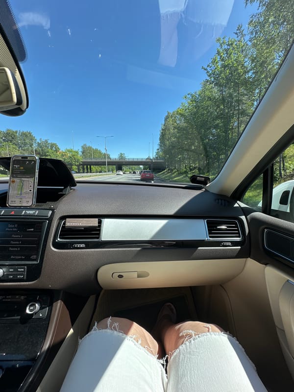 Highway drive through the Helsinki area on a sunny day