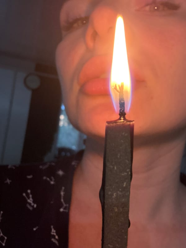 Person handles multiple burning objects in close-up photography session