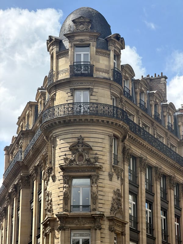 Routine street scenes documented across central Paris during midday