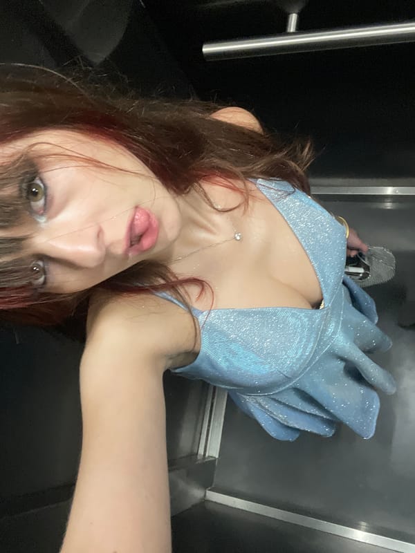 Dressed up and ready to go, elevator selfies in Raanana