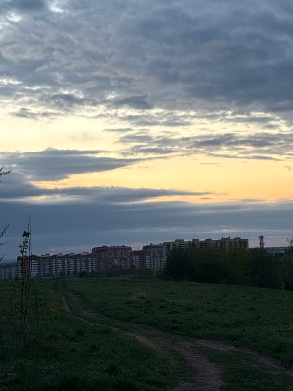 Golden light strip observed through clouds over Dmitrov field