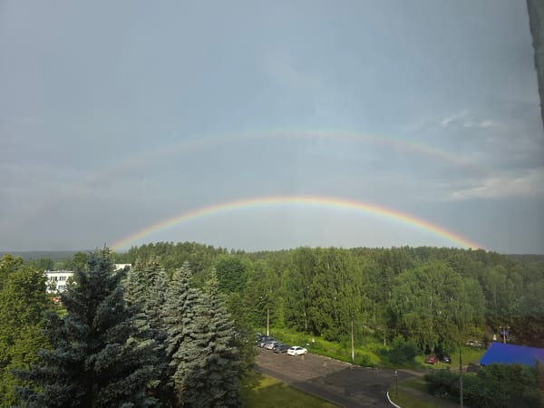 Double rainbows over Chaikovsky, paired with casual evening snapshots.