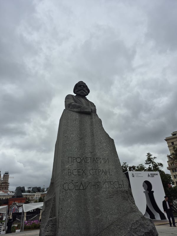 Karl Marx monument, fountains, and ballerina sculpture in central Moscow
