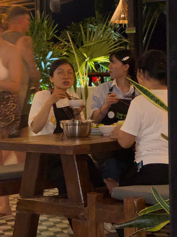 Restaurant dining and kitchen operations documented in Hà Giang Ward
