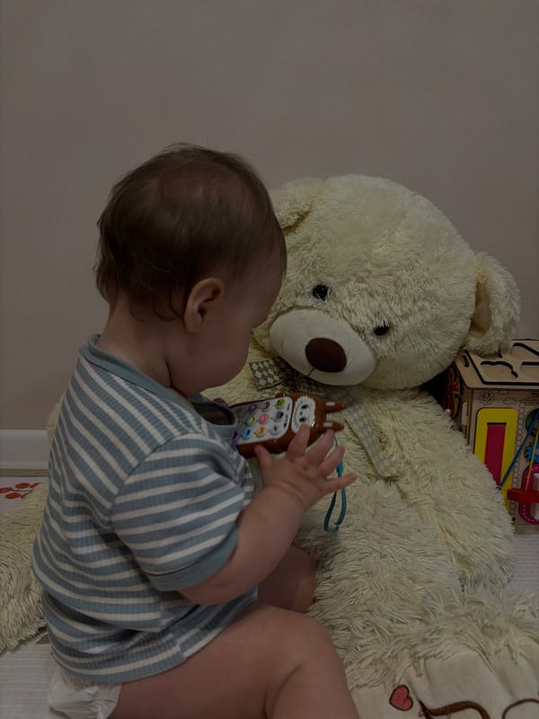 Baby playtime with toys and caregiver documented over 12-minute span