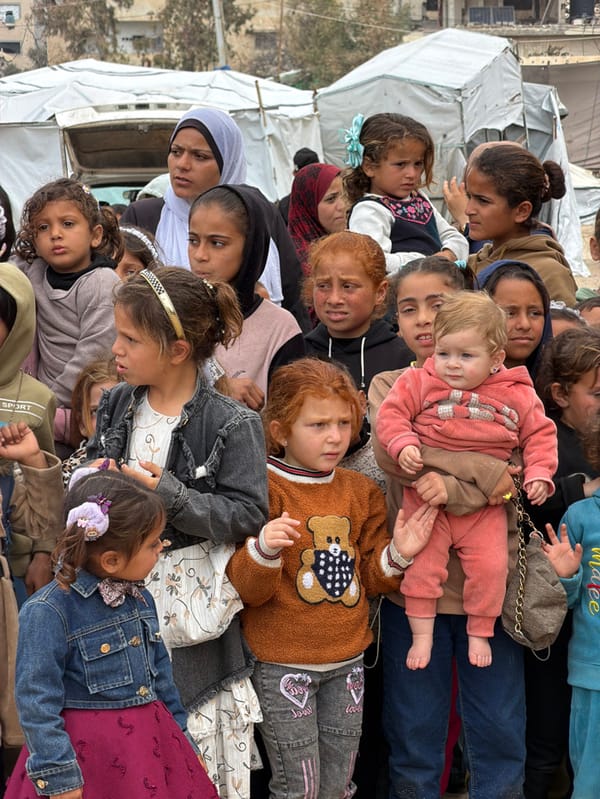 Children gather for outdoor performance in Gaza displacement camp