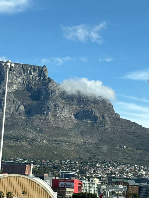 Table Mountain partially shrouded in clouds over Cape Town