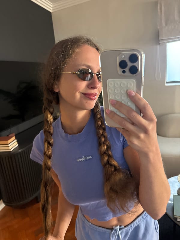 Woman takes selfie indoors in Cape Town