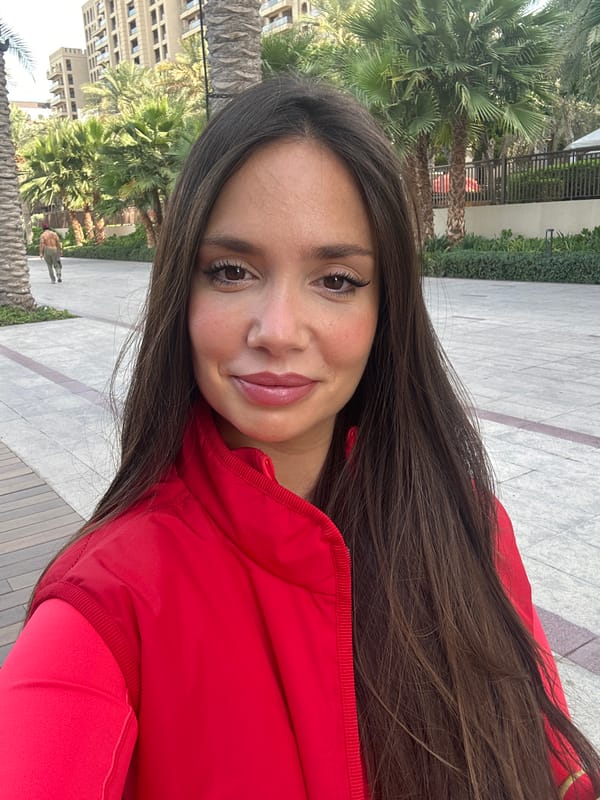 Early morning dog walk captured in modern Dubai district