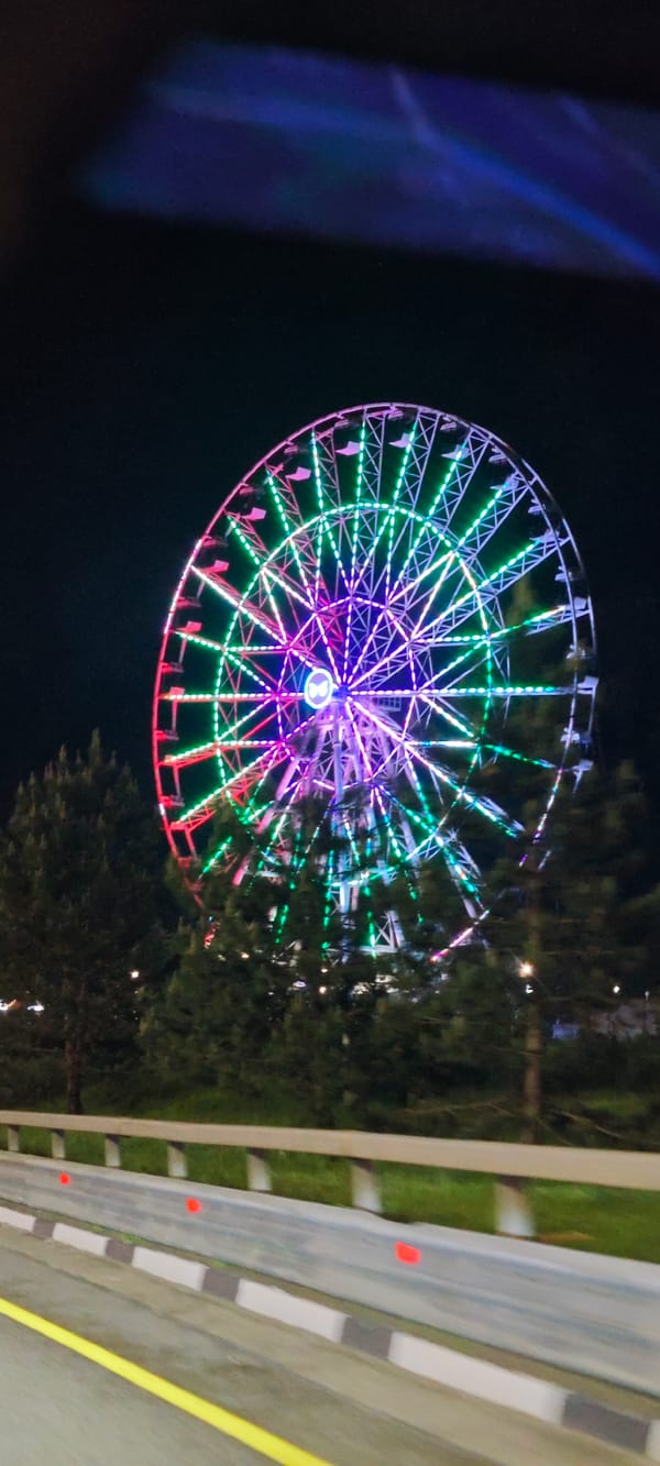 Illuminated Ferris wheel draws attention in Estosadok, Russia