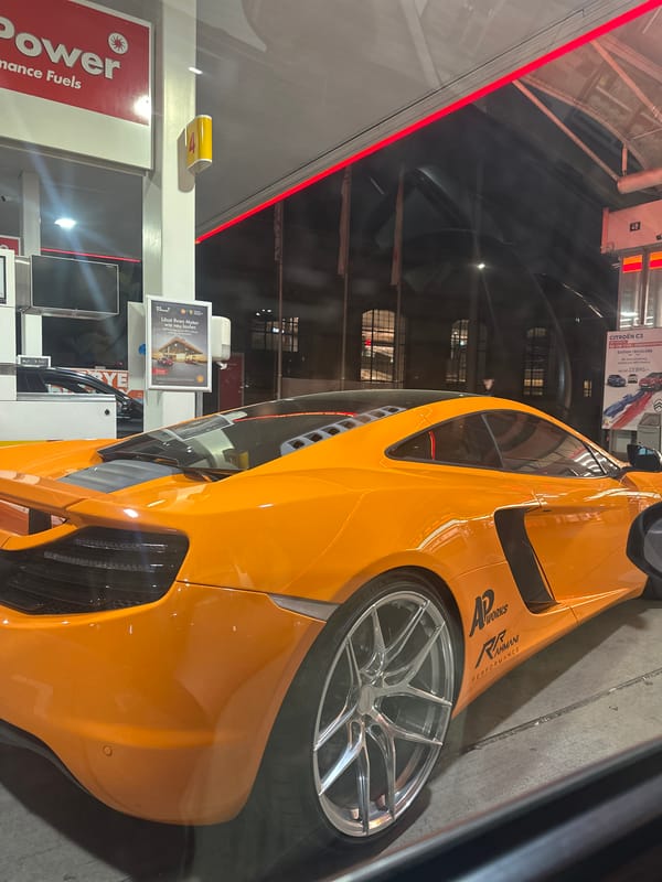 Orange McLaren spotted at Shell station in Winterthur